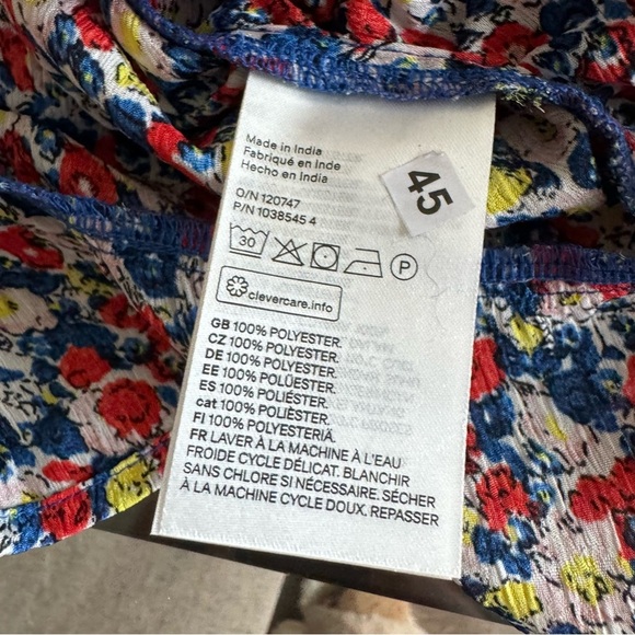 NWT! V-Neck Gather Front and Smocked Back Dainty Floral Top with Ties on Cuff - Picture 2 of 10